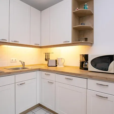 Апартаменты Familyhaus- 8 Тиммендорфер-Штранд